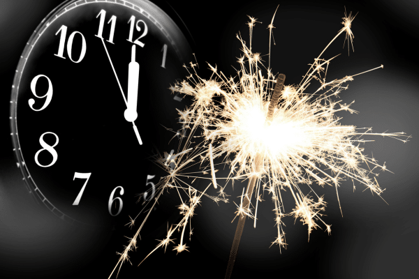 Clock striking midnight and fireworks, Happy new year!