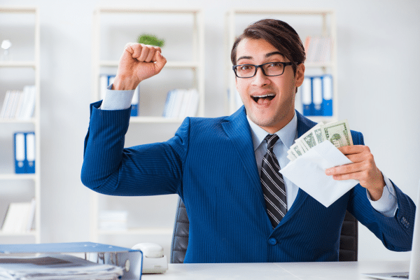 Employee hesitantly cheering while holding cash - are your employee incentives driving great CX or destroying it? By Brittany Hodak