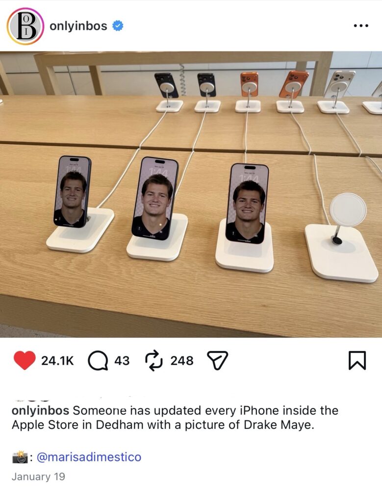 Apple store displays iphones and the wallpaper is Patriots quarterback, Drake Maye. Great customer loyalty strategy for Apple to ingratiate itself in the local community.