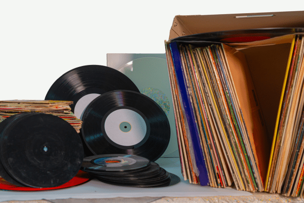 stacks of vinyl records and albums - featured image for 3 experiential marketing examples that turned album launches into movements