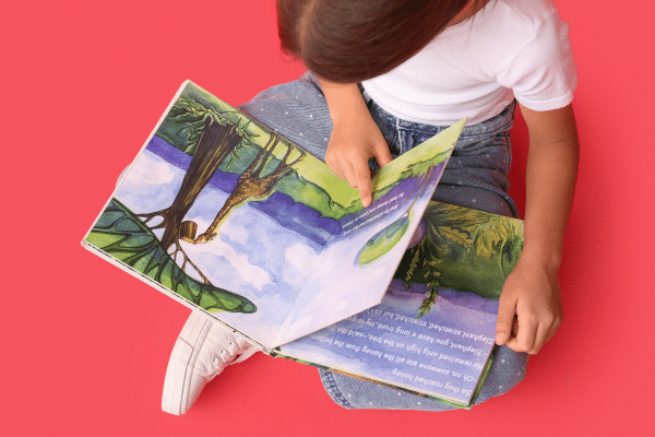 child reading a book - how AI is changing customer expectations - brittany hodak